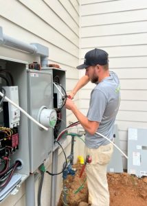 electrician-working-on-outside-box