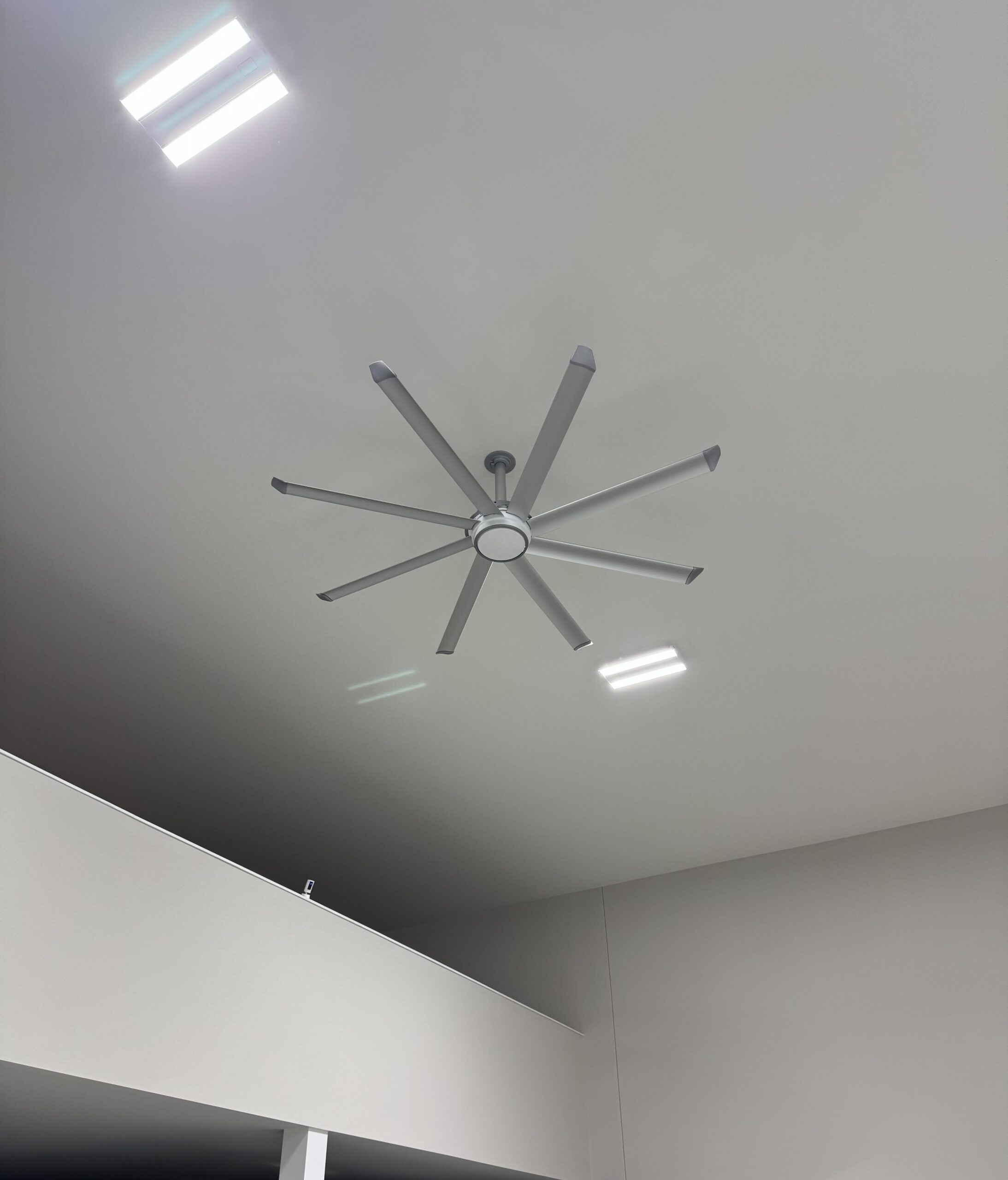Modern ceiling fan installation for improved home ambiance and energy efficiency.
